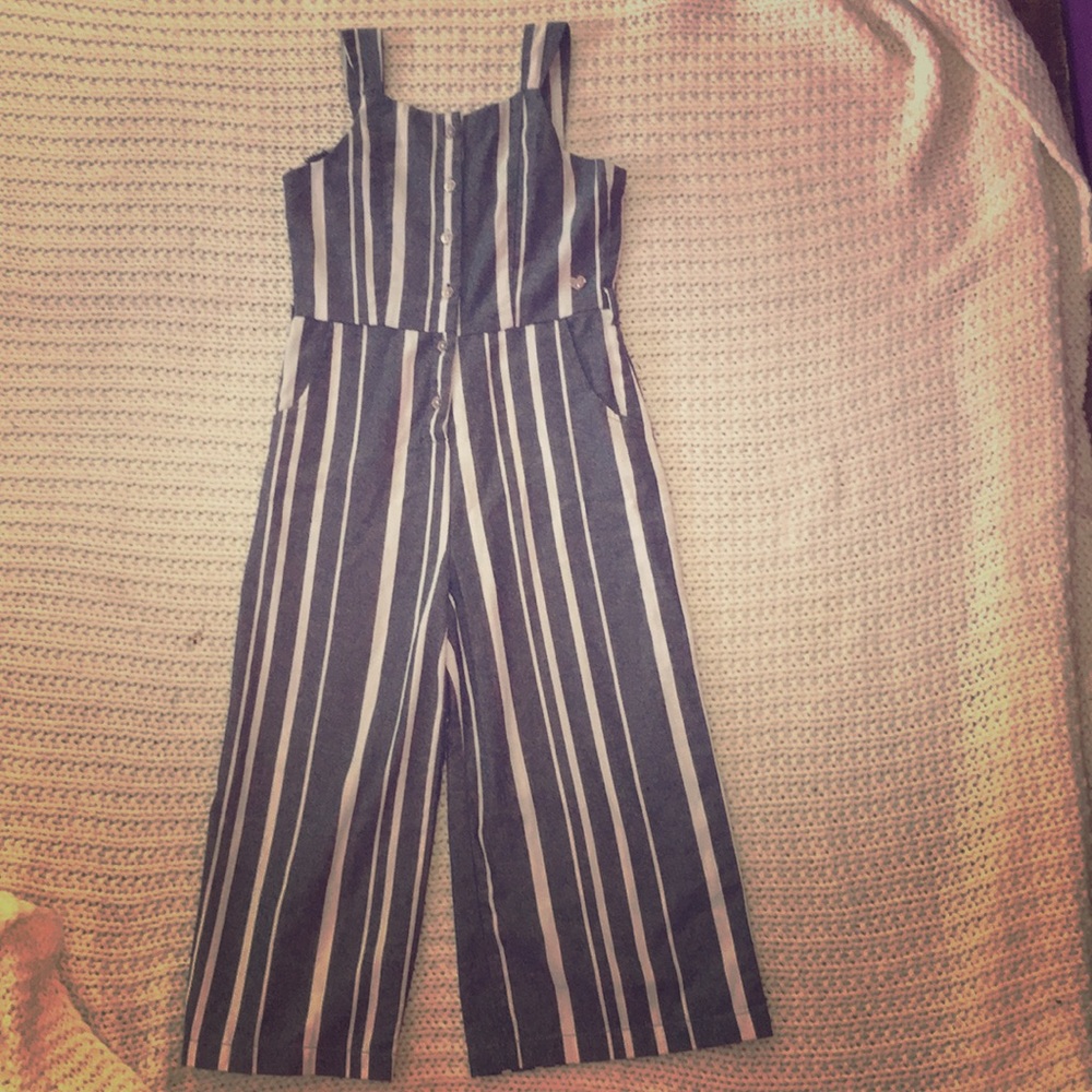 Summer time jumpsuit with buttons down the middle